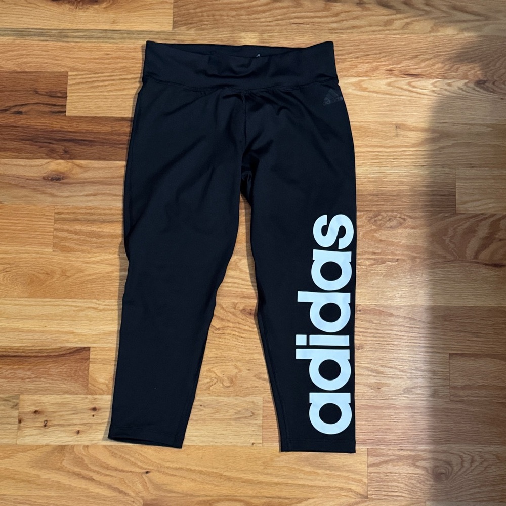 Adidas women’s capri Black Leggings Medium with bold white  Logo no holes